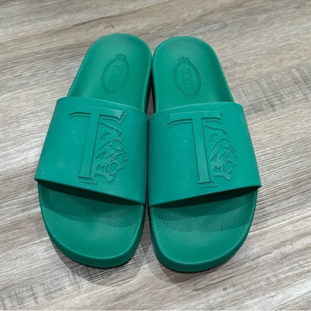 Tod’s Logo Embossed Slide Leone Sandals Clear Bottle in Green